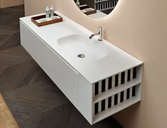 Ein moderner, schwebender Waschtisch von Antonio Lupi mit integrierter Waschbeckenfläche in mattem Weiß.